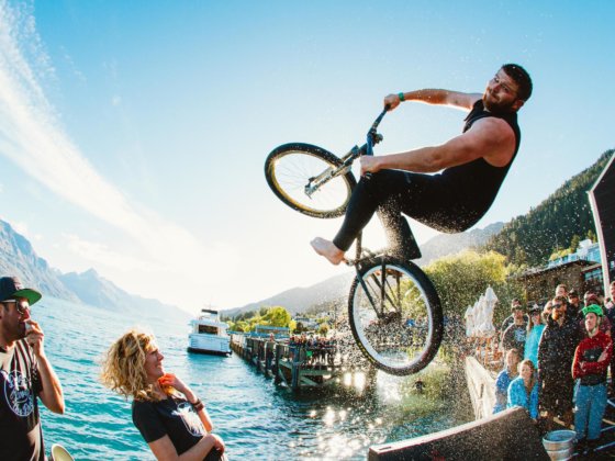 Flipping into the Queenstown Lake on his bike