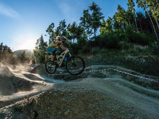 Amy jumping Wynyard mini dream trail, Queenstown