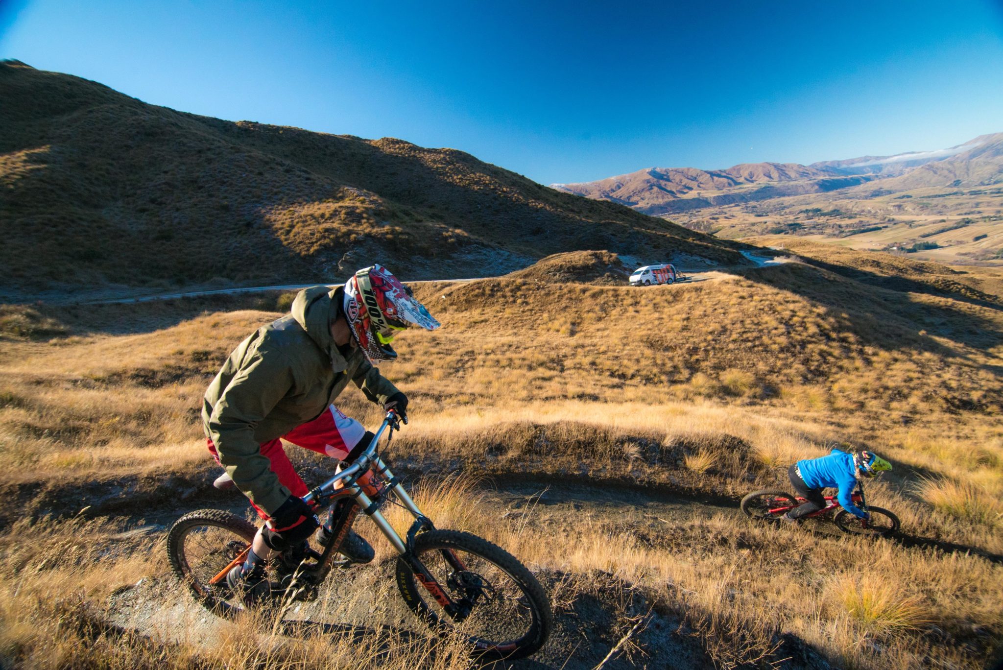 Queenstown Bike Taxis - Queenstown's Number 1 Mountain Bike Taxi Director Amy hooning down Zoot Trail Queenstown Otago New Zealand.